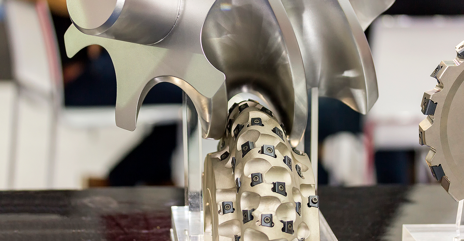 Hob cutter making a spiral, helical gear wheel on a CNC machine.