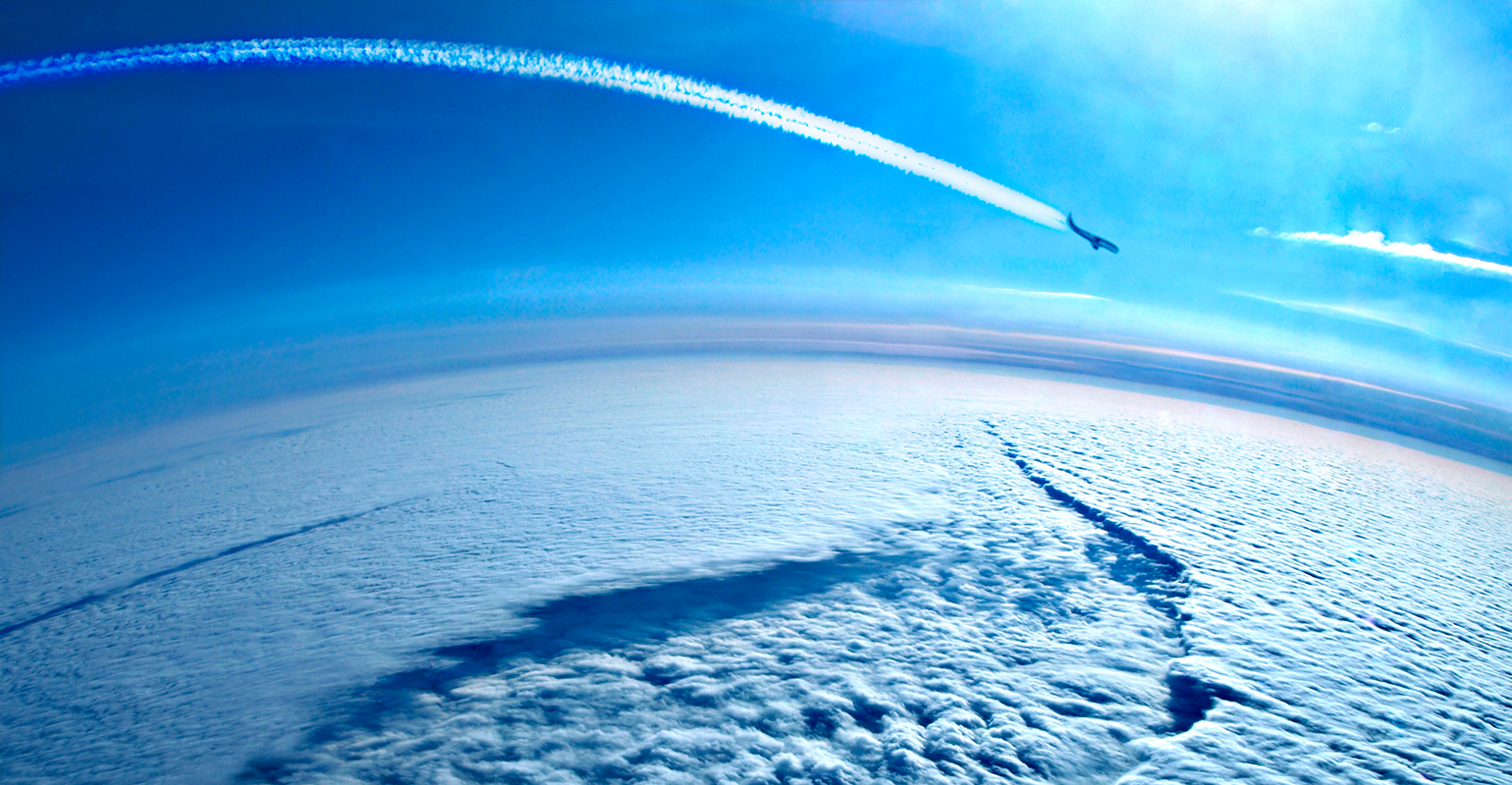 Airplane contrails in the blue sky.