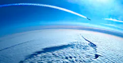 Airplane contrails in the blue sky. Airplane contrails in the blue sky.