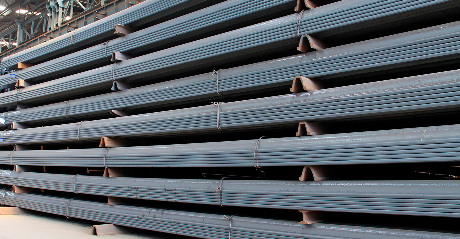 Finished steel in a warehouse.