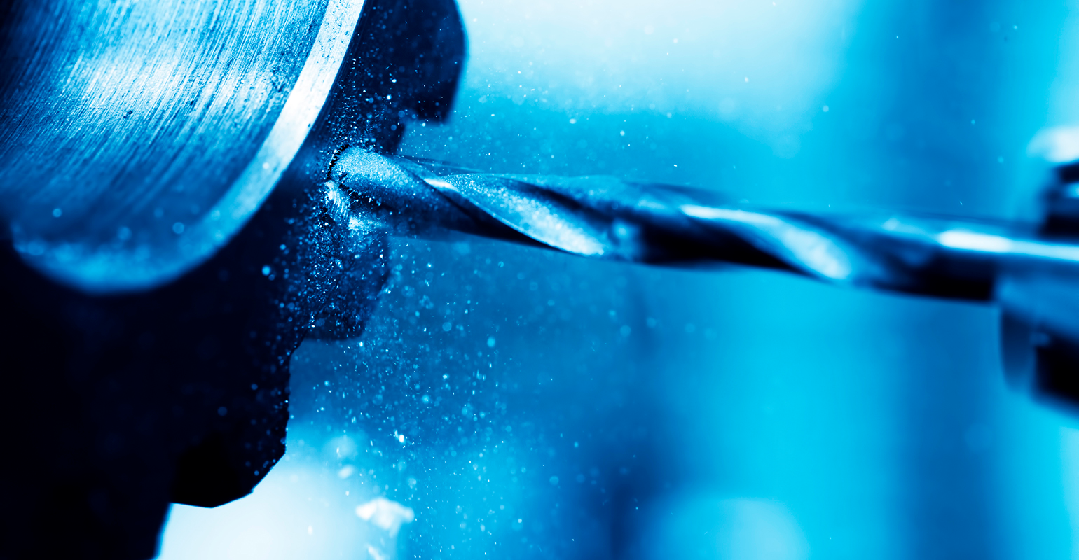 CNC drilling and boring machine at work, close-up.