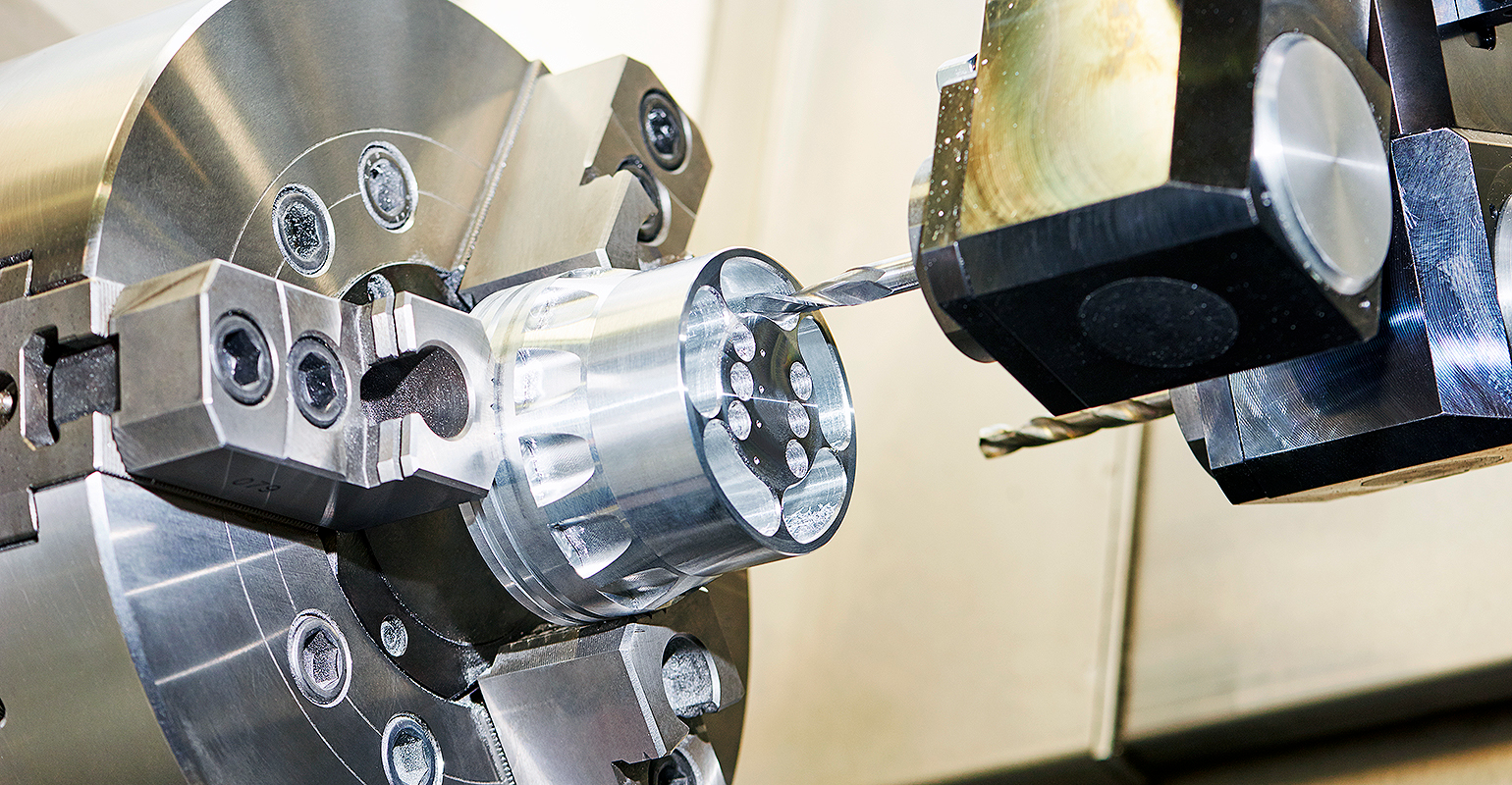 CNC machining center, with cutting insert.