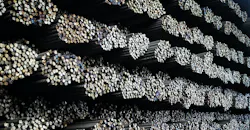 Steel warehouse with rebar stockpile. Steel warehouse with rebar stockpile.