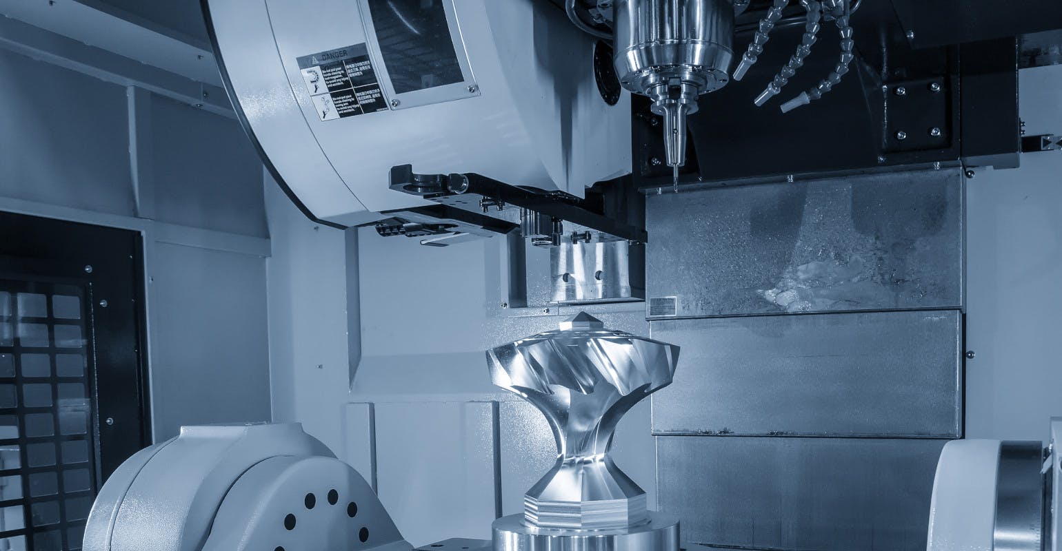 Five-axis machining center with the solid ball endmill tooling.