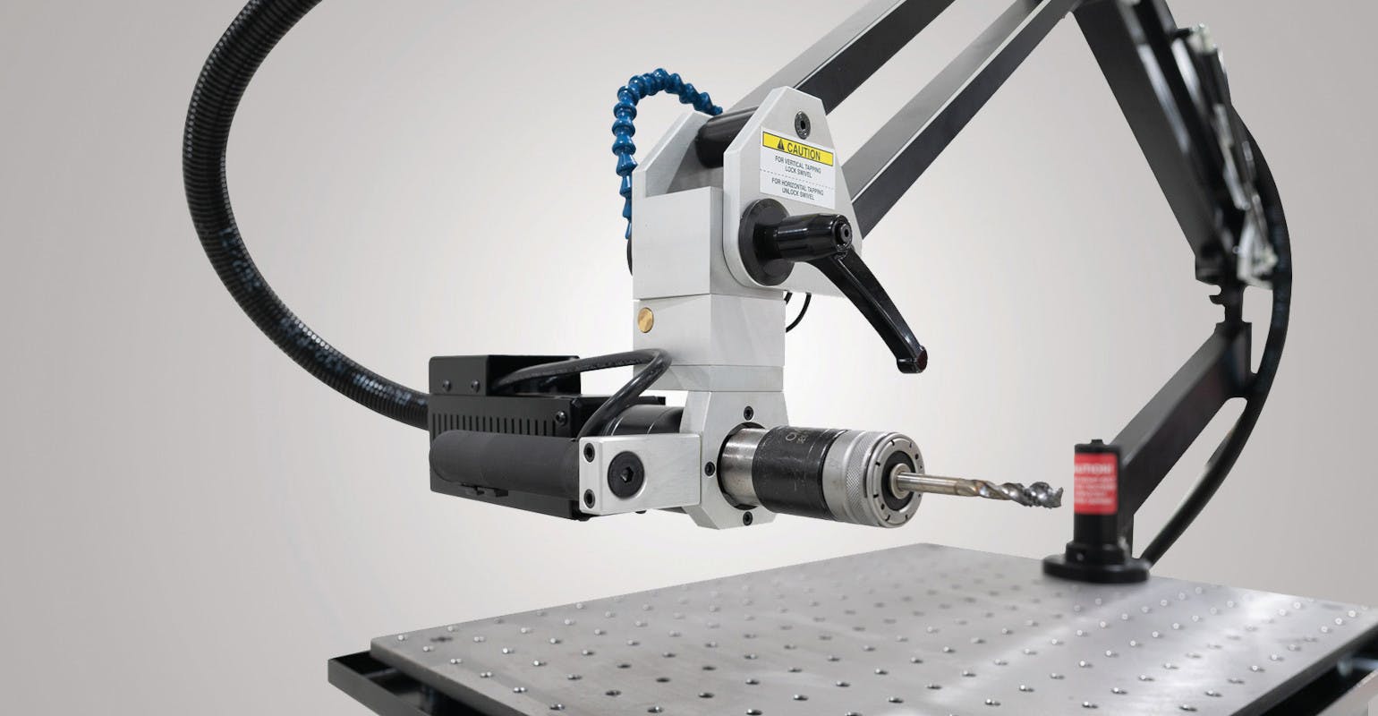 The flexible FlexArm REM-24D electronic tapping arm with a multi-position head that allows quick and easy switches between vertical and horizontal tapping.