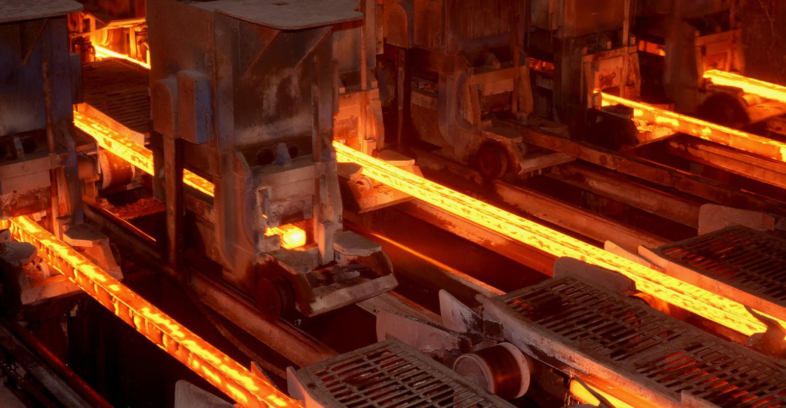 Multi-strand continuous casting of steel billets.