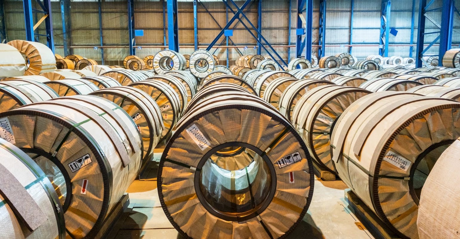 Hot-rolled steel coil, packaged for shipping.