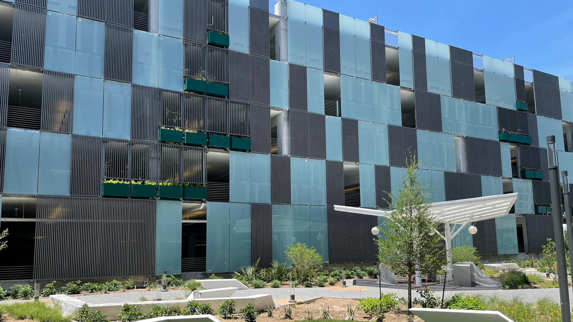 Compression-Clipped Glass Parking Fa&ccedil;ade System