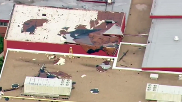 An aerial view of roof damage at Grayslake Central High School