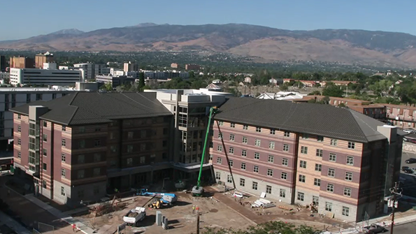 Workers are wrapping up construction of Peavine Hall a student housing development at University of Nevada Reno
