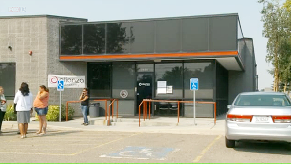 Parents gathered outside Alianza Academy in West Valley City Utah after learning the school would be shutting down