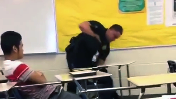 Video shows police officer flipping a student while she sits in her desk in Columbia SC