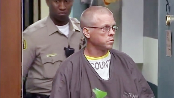 Former high school wrestling coach Thomas Snider is brought into court for sentencing