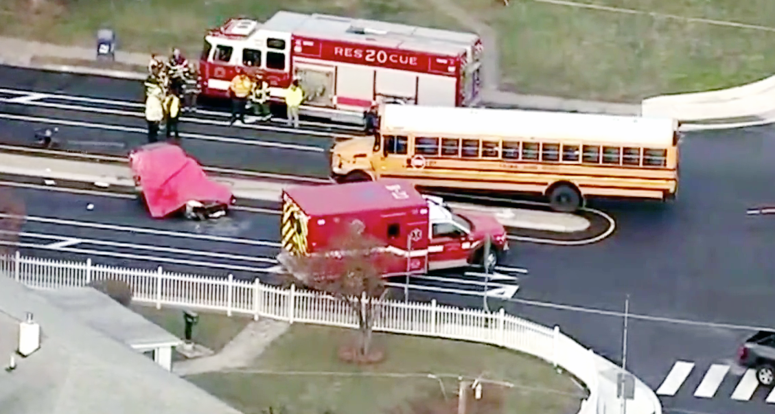 A 16-year-old student died when the car she was driving and a school bus were involved in a crash.