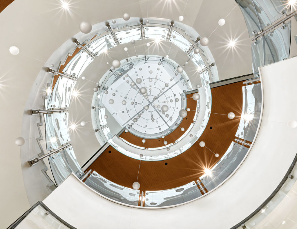 A centerpiece of Colorado State University's Health and Medical Center in Fort Collins is a glass skylight complemented by a glass-and-steel spiral staircase that helps disperse daylight through the building.