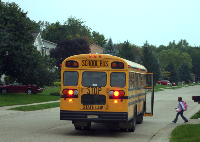 Child Getting On School Bus 61e05a85274c4