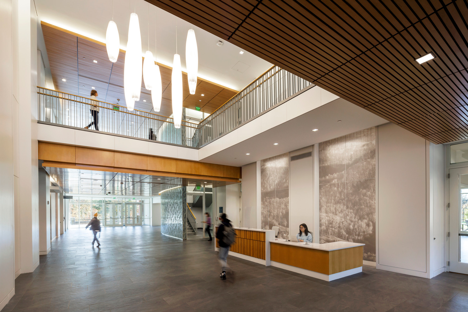 The open transparency of the ground-level lobby at the University of Virginia's center provides a passageway through all interior levels and invites students in.