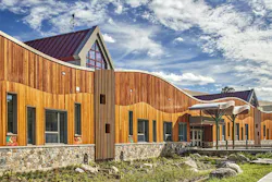 The design of the new Sandy Hook Elementary balances a nurturing environment with sustainable building and security. It presents a buffer against intrusion—anyone crossing it at a point other than a bridge will be noticed quickly. The design of the new Sandy Hook Elementary balances a nurturing environment with sustainable building and security. It presents a buffer against intrusion—anyone crossing it at a point other than a bridge will be noticed quickly.