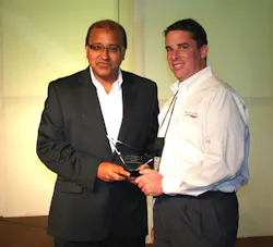 Xcellerex accepting trophy from Invensys Operations Management CEO and president Sudipta Bhattacharya. Xcellerex accepting trophy from Invensys Operations Management CEO and president Sudipta Bhattacharya.