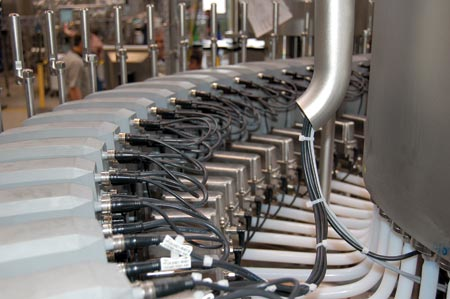 The Ultra-Lock system provides connections to boxes on the Krones machine, each of which contains the pneumatic control function
