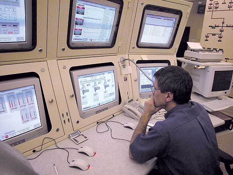 Operators keep a bird's eye view on the Weston electric power plant.