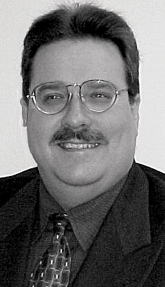 Al Hufstetler(shown here), UGS vice president of marketing, e-Factory, and Amir Livne, Tecnomatix executive vice president, mark