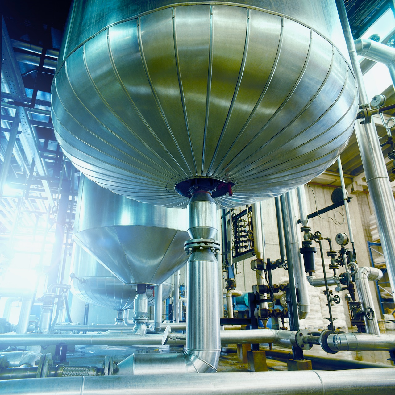 In the chemical industry, reactors are often a bottleneck in the manufacturing process. There is significant latency in chemistry, which makes control difficult and losses can be identified by collecting process data and reconciling it with human context.