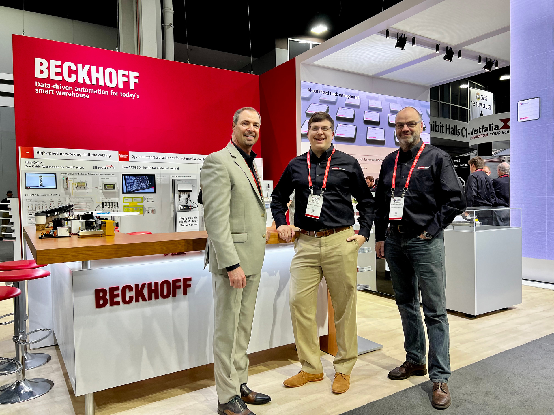 The industry team gathers at MODEX 2022 (from left): Doug Schuchart, Global Intralogistics Industry Manager; Nathan Hibbs, Material Handling & Intralogistics Business Development Manager; and Gilbert Petersen, Material Handling & Intralogistics Application Specialist. (&copy; Beckhoff, 2022)