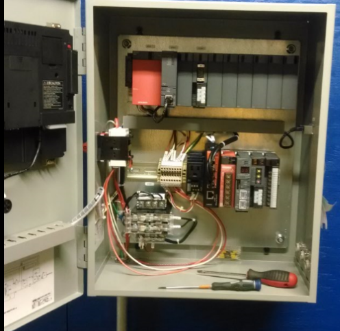 A control cabinet created by Versatech for Agri-Fab featuring Mitsubishi Electric technology.