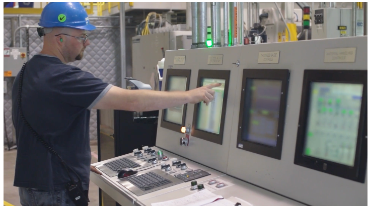 Monitoring production of GAF's EnergyGuard Polyiso Insulation&mdash;a roof insulation panel made of glass fiber reinforced cellulosic felt facers bonded to a core of polyisocyanurate foam.