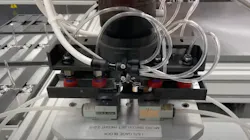 A custom Rapid Robotics' robot gripper for COVID PCR test kit assembly. A custom Rapid Robotics' robot gripper for COVID PCR test kit assembly.