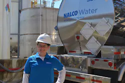 An associate of Nalco Water, an Ecolab company, working at a customer plant. An associate of Nalco Water, an Ecolab company, working at a customer plant.