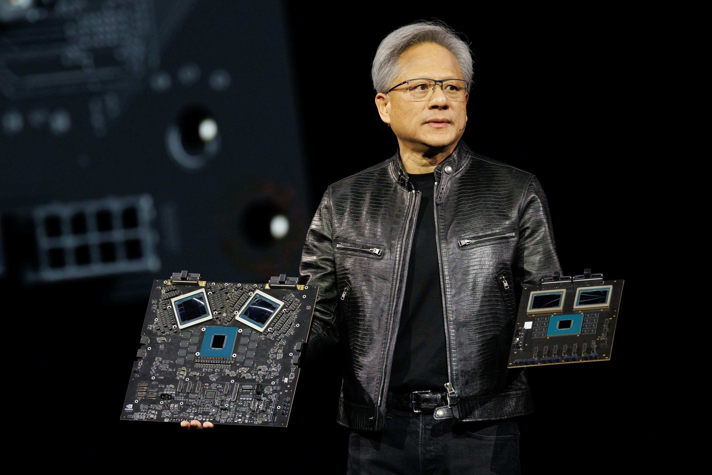 Nvidia CEO Jensen Huang shows off the new GB200 Grace Blackwell Superchips at the company&rsquo;s GTC event in March 2024. These new chips can reportedly process trillion-parameter models with constant uptime for superscale generative AI training and inference workloads. Source: Nvidia
