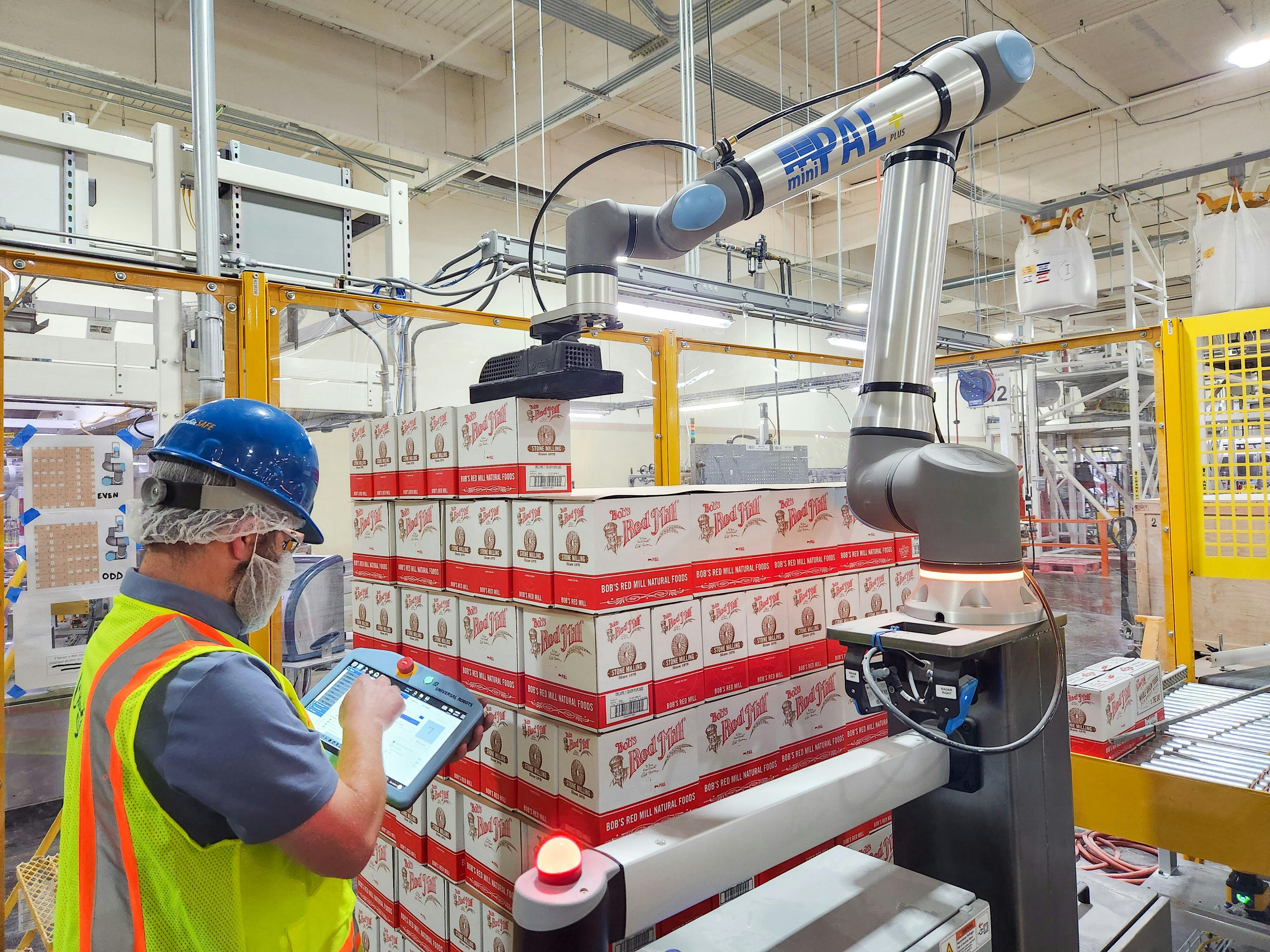 UR20, along with UR30, are Universal Robots' new-generation, high-payload cobots. Here, the UR20 is being used for palletizing at the Bob's Red Mill facility.