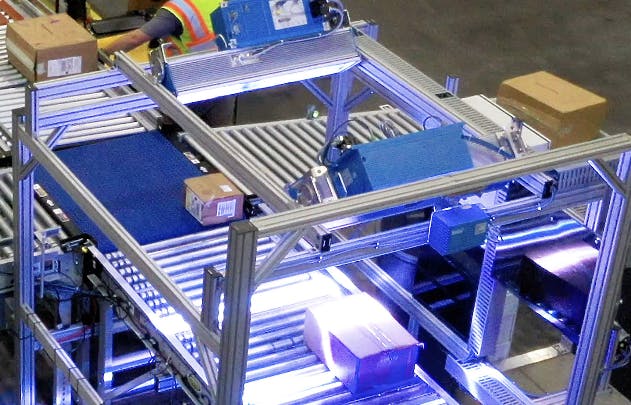 Regal Rexnord's ModSort Divert and Transfer module in use with multiple conveyor lines.