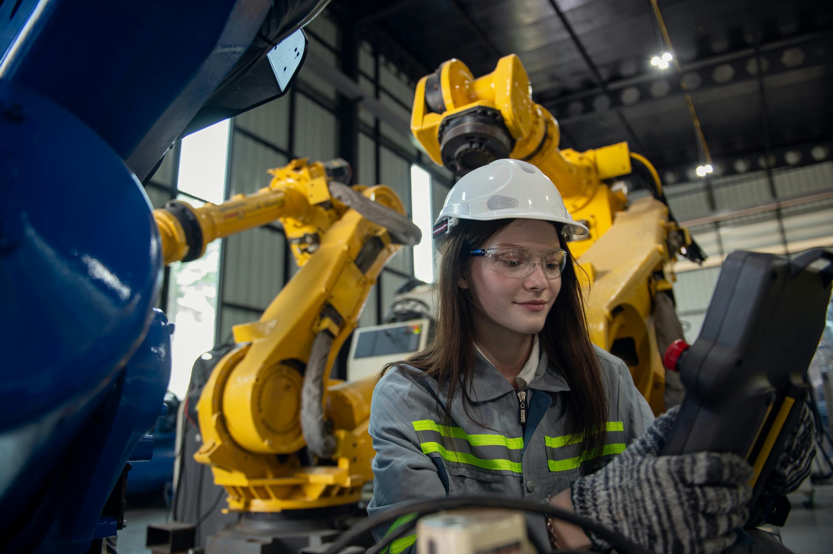 Engineer reviewing robotic workcell