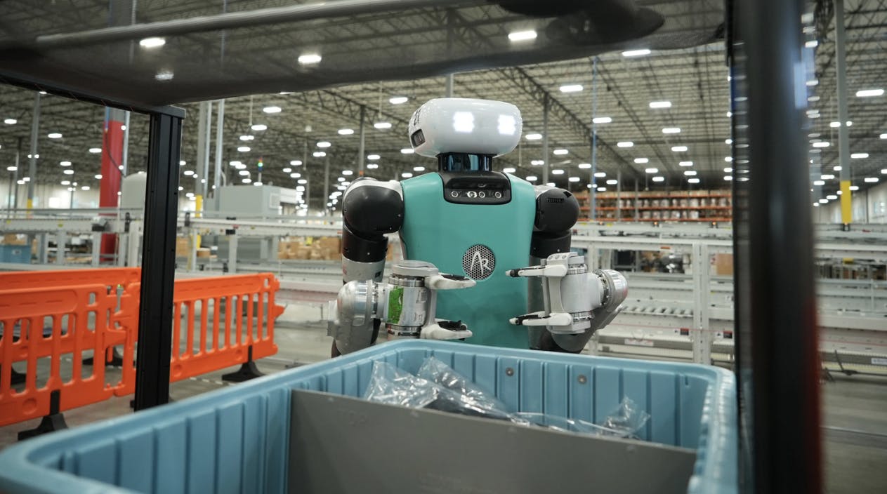 Digit preparing to pick a tote