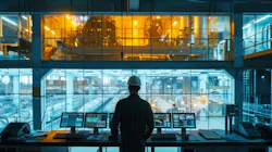 Industrial engineer in control room Industrial engineer in control room