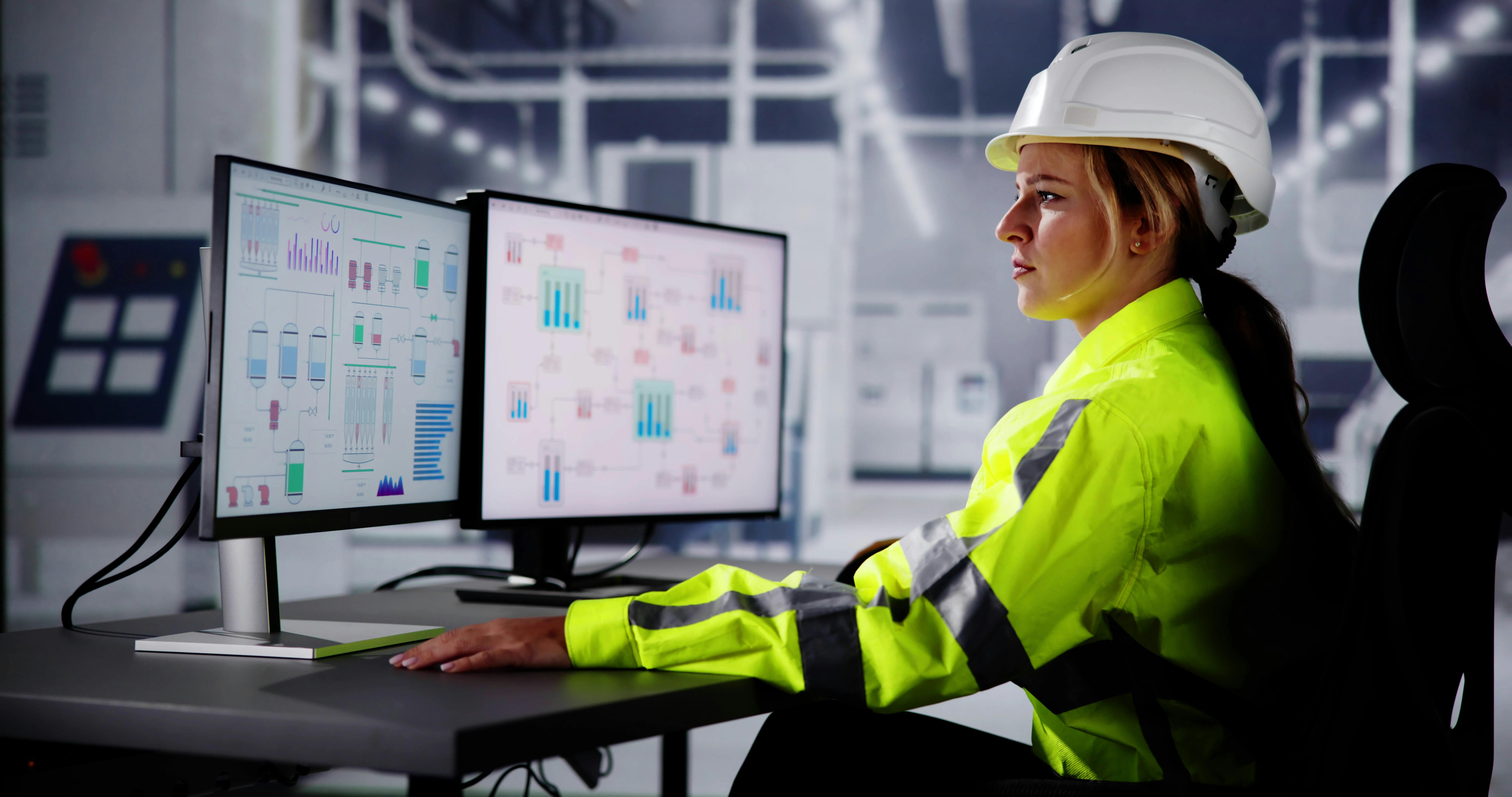 industrial engineer reviewing SCADA screen