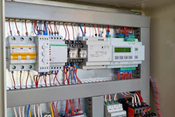 Controller, power supply, phase control relay, circuit breaker in a electrical/control cabinet. Controller, power supply, phase control relay, circuit breaker in a electrical/control cabinet.