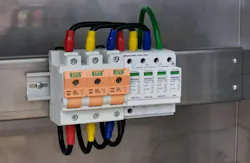 Photo of switch fuse and surge protection device connection in electrical cabinet. Photo of switch fuse and surge protection device connection in electrical cabinet.