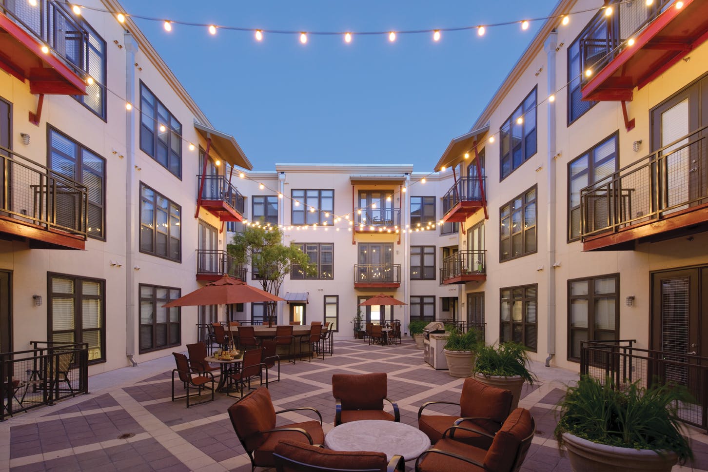 Gables 5th Street Commons, a four-story, 138-unit mixed-use apartment complex by developer Gables Residential, near the Universi