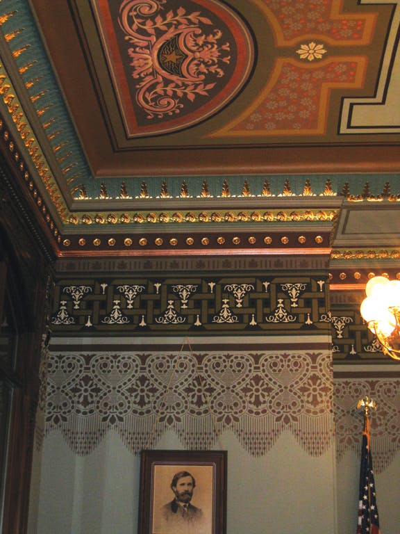 Where the walls were previously painted white, the results of EverGreenes finishes investigation in the Illinois State Capitol