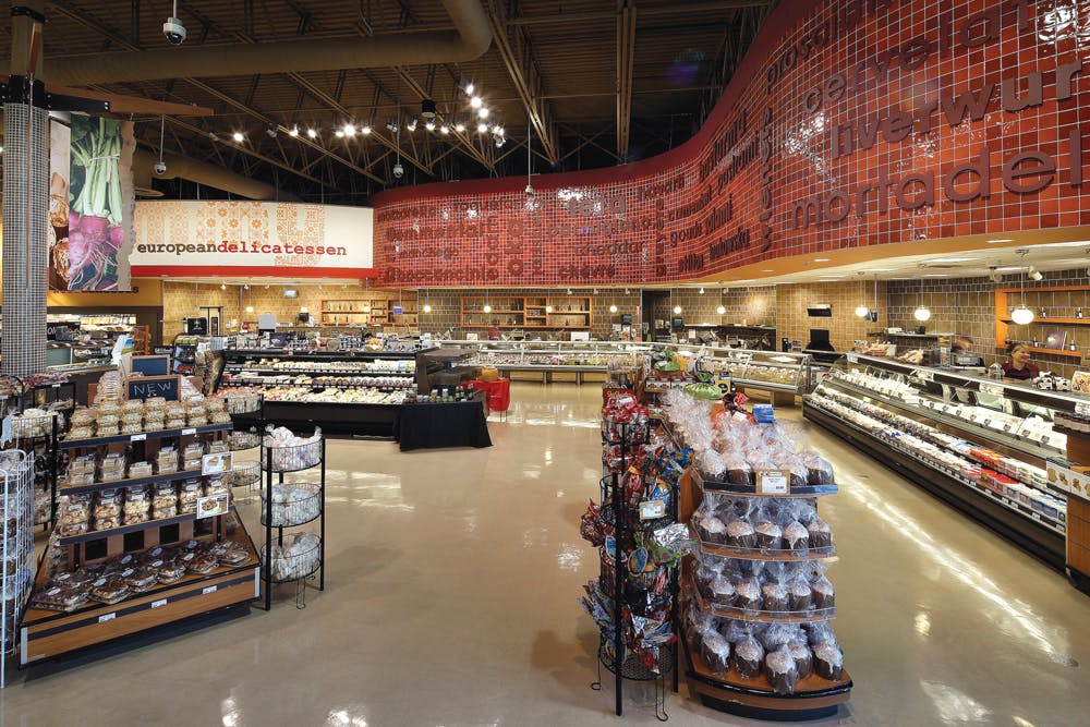 Created by api(+) through renovation of an existing store, Yummy Market brings European-style shopping to suburban Toronto. The new 50,000-sf market includes a kitchen for prepared foods, bakery/patisserie, deli, butcher shop, fishmonger, juice bar, caf, flower shop, self-serve bulk foods, and an extensive array of imported specialties. Photo: Anthony Gomez/A.G. Photography