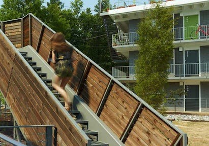 ECO Modern Flats is a wellness-oriented apartment complex in Fayetteville, Ark., created from reconstruction of a property built