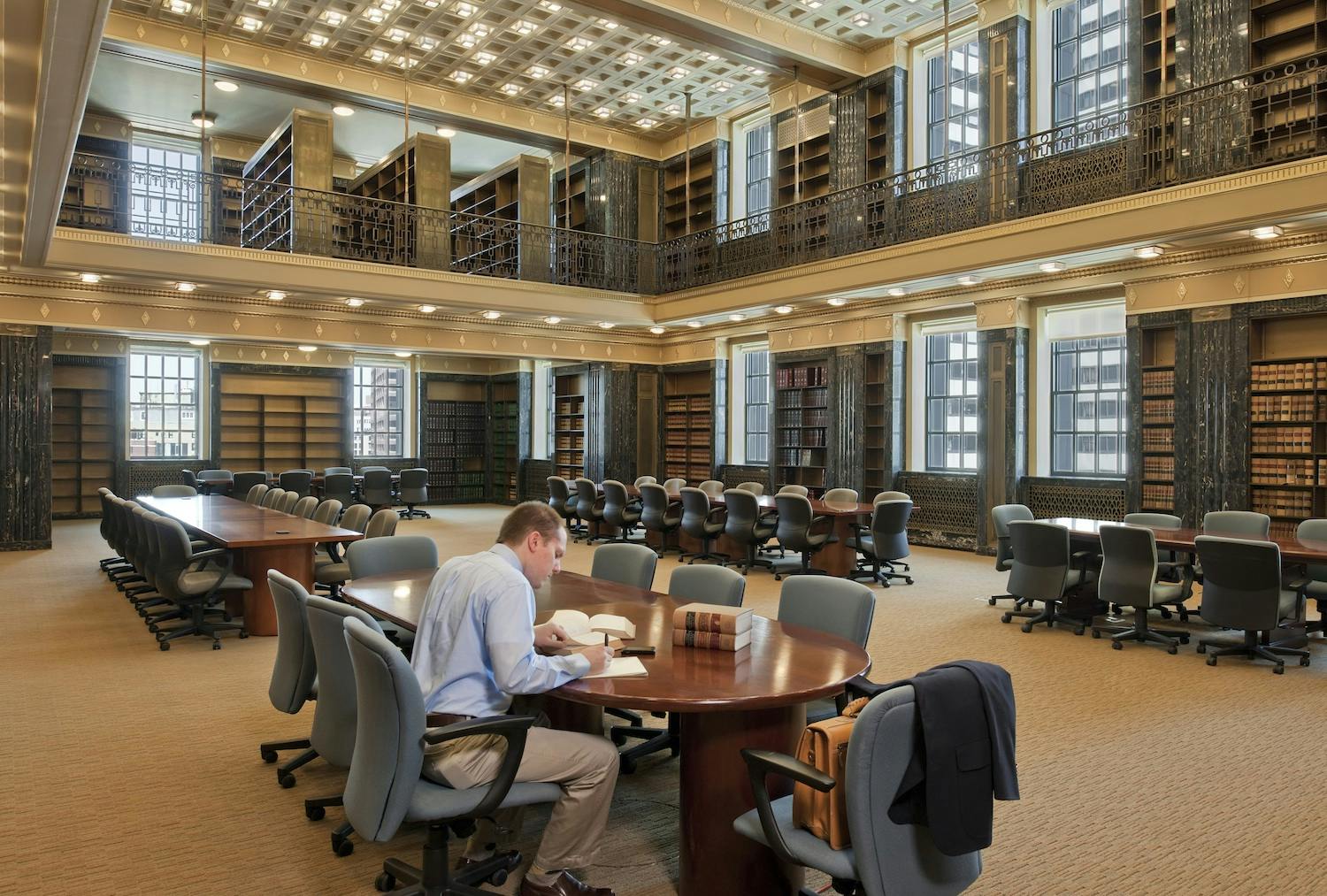 In restoring the library at the McCormack federal building, the Building Team recreated the original ceiling lights, cleaned the