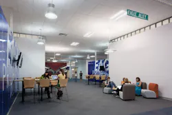 The design for Joplin Interim High took advantage of large openings, oversized pivot doors, and a wide variety of furniture tha The design for Joplin Interim High took advantage of large openings, oversized pivot doors, and a wide variety of furniture tha