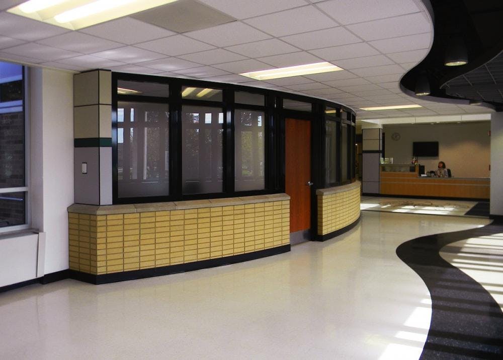 For a recent renovation of a stairwell and exit corridors at Ridgewood High School in Norridge, Ill., the design team specified