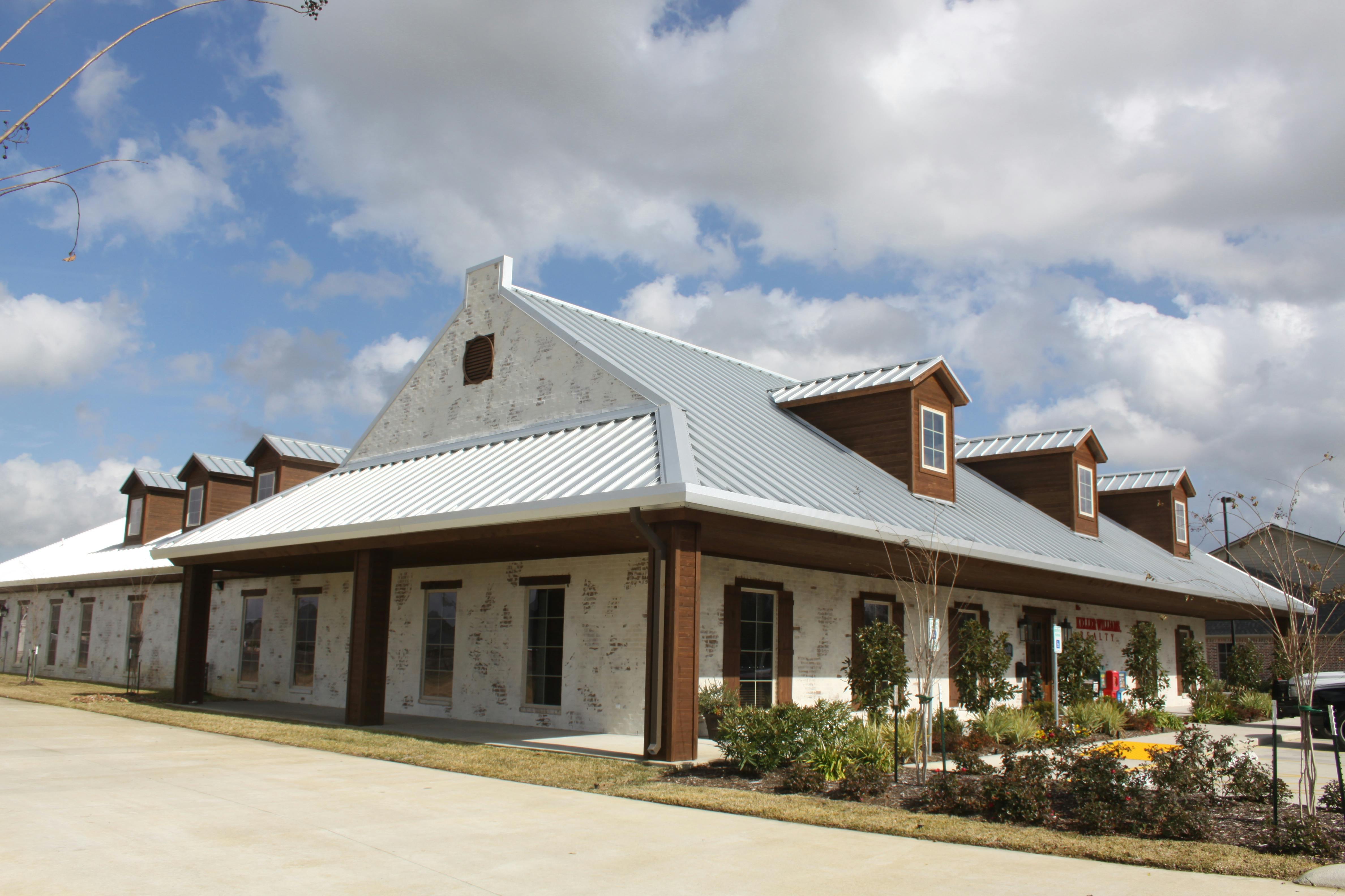 A Custom Metal Building Serves As The Home Of Ron Cleveland Construction Company And Keller Williams Realty In Beaumont, Texas