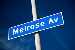Outdoor daylight photo of Melrose Ave. sign with blue sky in Los Angeles. Photo: billnol via iStock Outdoor daylight photo of Melrose Ave. sign with blue sky in Los Angeles. Photo: billnol via iStock